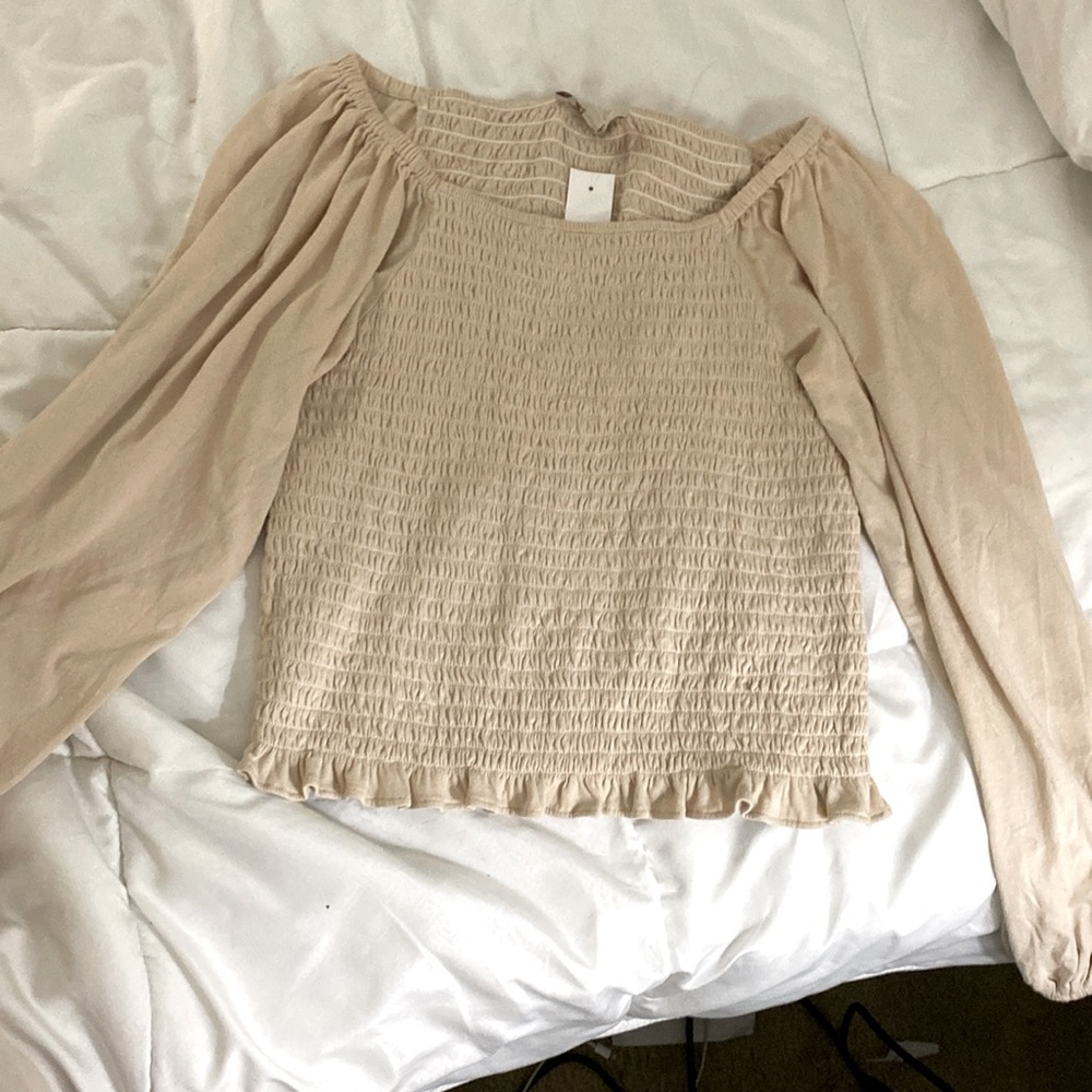 This is a nice soft blouse that could be casual or dressy.